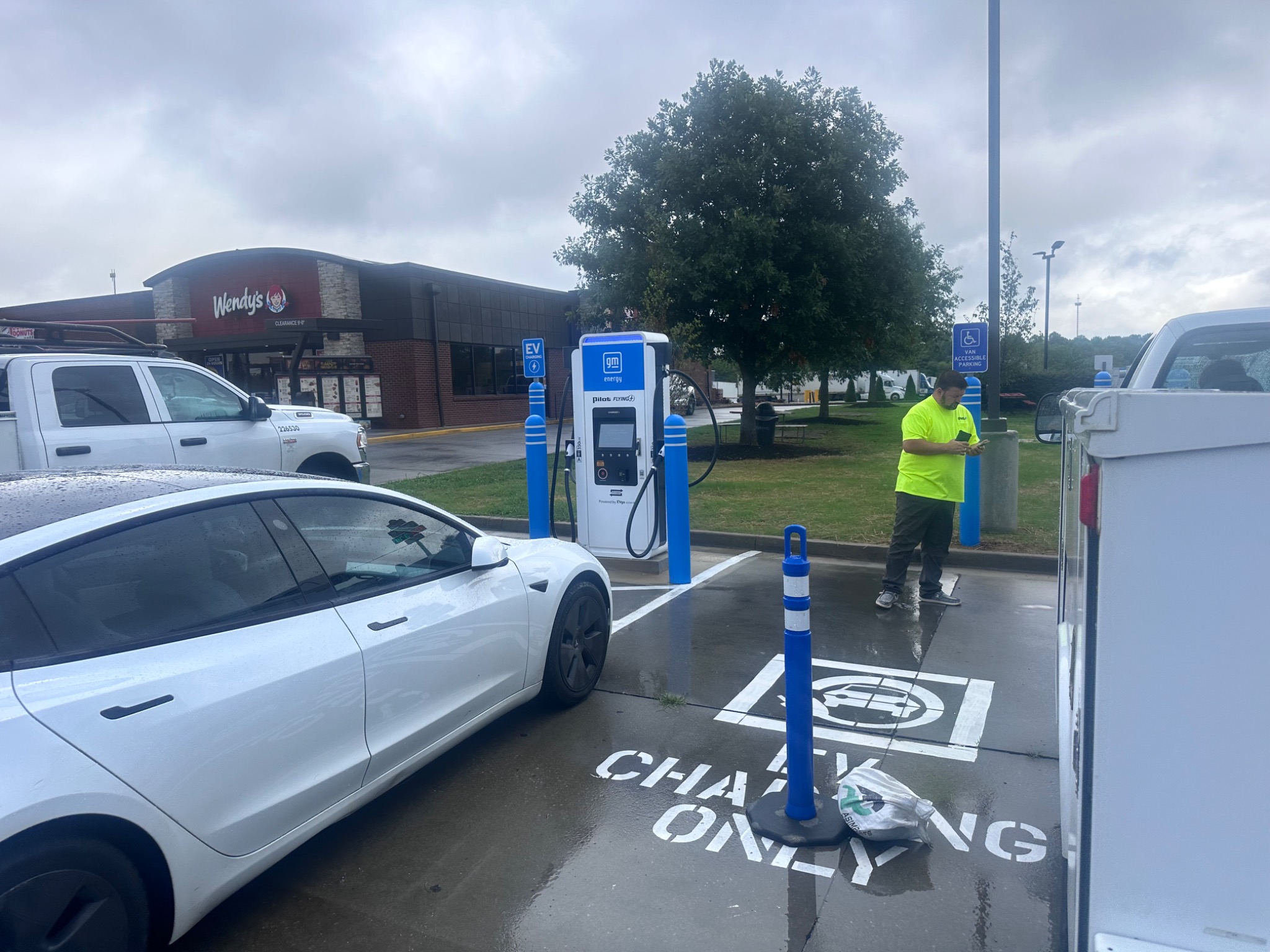 Electric vehicle charging stations installed at a commercial site