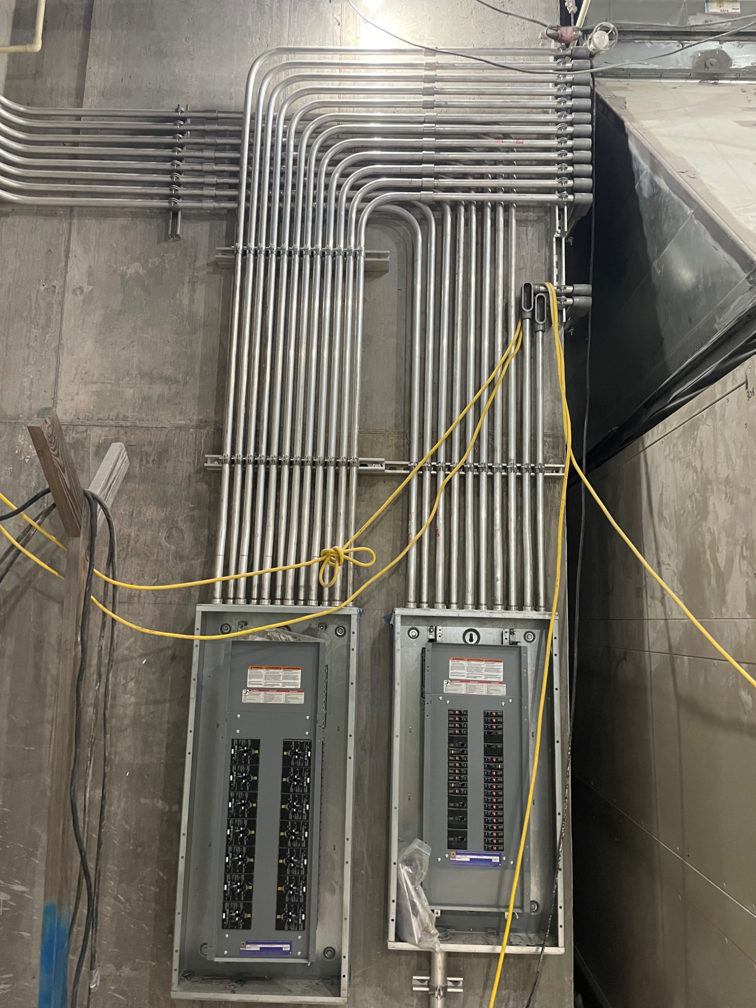 Electrical panels and conduit installation at the Eastman project