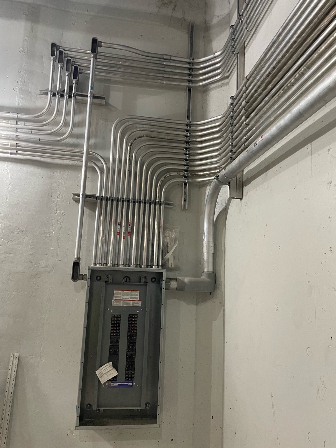 Industrial electrical panel with heavy conduit network